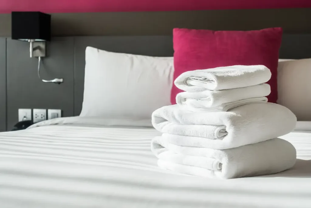 folded-towels-bed