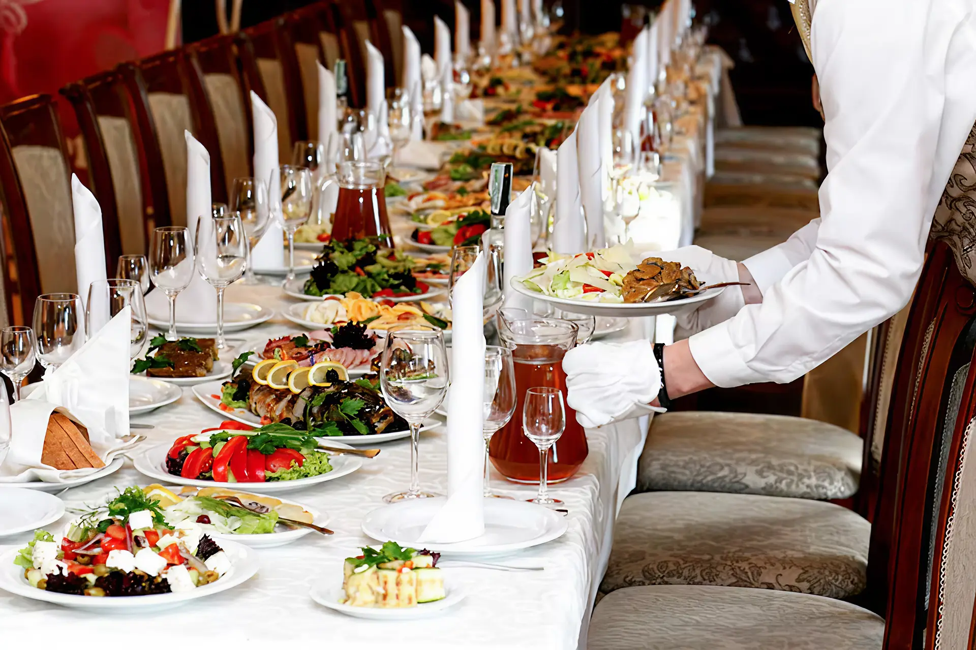 waiter-serving-food-luxury-table-set-wedding-reception-catering-restaurant_250813-25537 2